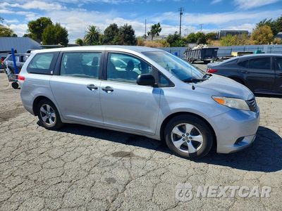 Czwarte zdjęcie samochodu z boku: 2014 TOYOTA SIENNA L 7-PASSENGER VIN:5TDZK3DC5ES464249 - miniatura