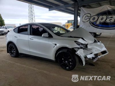 Czwarte zdjęcie samochodu z boku: 2023 TESLA MODEL Y VIN:7SAYGDEE7PF792429 - miniatura