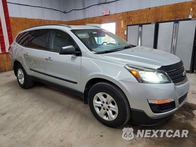 Czwarte zdjęcie samochodu z boku: 2016 CHEVROLET TRAVERSE LS VIN:1GNKRFKDXGJ262637 - miniatura