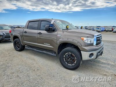 Czwarte zdjęcie samochodu z boku: 2012 TOYOTA TUNDRA CREWMAX SR5 VIN:5TFEY5F16CX120697 - miniatura