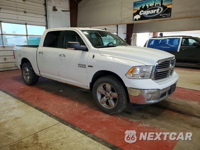 Czwarte zdjęcie samochodu z boku: 2017 RAM 1500 SLT VIN:3C6RR7LT3HG510966 - miniatura