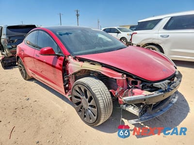 Czwarte zdjęcie samochodu z boku: 2023 TESLA MODEL 3 VIN:5YJ3E1EC6PF497137 - miniatura