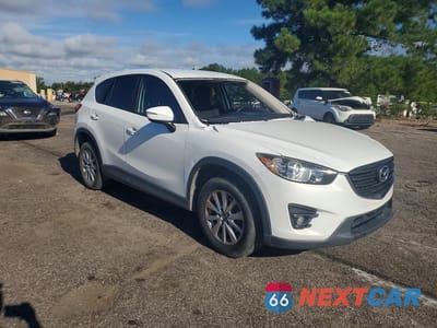 Czwarte zdjęcie samochodu z boku: 2016 MAZDA CX-5 TOURING VIN:JM3KE2CY7G0866190 - miniatura