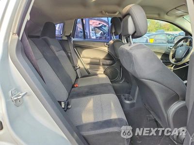Zdjęcie 11 z 13 samochodu: 2010 DODGE CALIBER MAINSTREET VIN:1B3CB3HA4AD542185 - miniatura