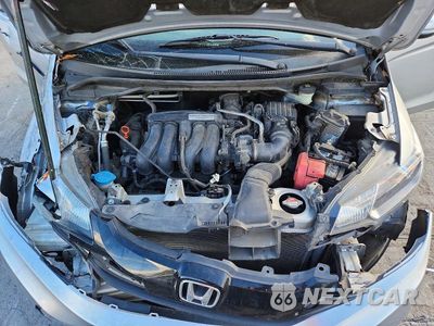 Zdjęcie 11 z 12 samochodu: 2015 HONDA FIT LX VIN:3HGGK5H54FM738056 - miniatura