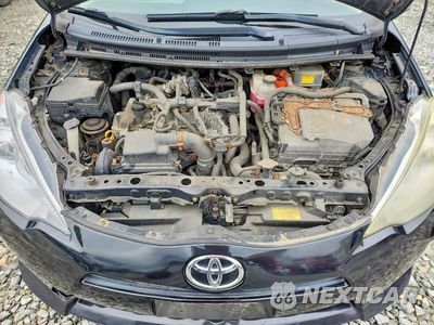 Zdjęcie 11 z 12 samochodu: 2012 TOYOTA PRIUS C TWO VIN:JTDKDTB34C1510064 - miniatura