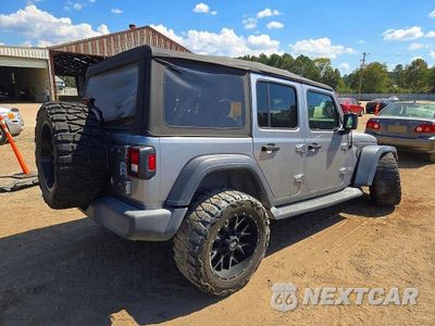 Trzecie zdjęcie samochodu z tyłu: 2018 JEEP WRANGLER UNLIMITED SPORT VIN:1C4HJXDGXJW164192 - miniatura