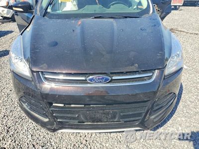 Zdjęcie 12 z 13 samochodu: 2013 FORD ESCAPE SEL VIN:1FMCU0HX2DUD11040 - miniatura