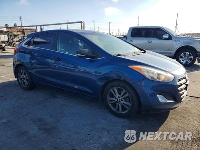 Czwarte zdjęcie samochodu z boku: 2016 HYUNDAI ELANTRA GT BASE VIN:KMHD35LH7GU295877 - miniatura