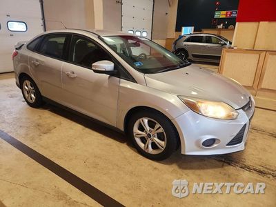 Czwarte zdjęcie samochodu z boku: 2014 FORD FOCUS SE VIN:1FADP3F25EL232418 - miniatura