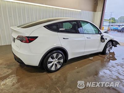 Trzecie zdjęcie samochodu z tyłu: 2023 TESLA MODEL Y VIN:7SAYGDEE7PF755574 - miniatura