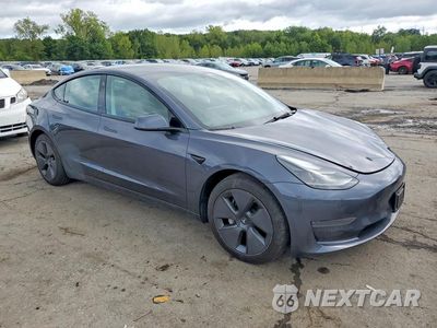 Czwarte zdjęcie samochodu z boku: 2023 TESLA MODEL 3 VIN:5YJ3E1EAXPF644199 - miniatura
