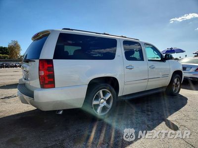 Trzecie zdjęcie samochodu z tyłu: 2014 CHEVROLET SUBURBAN C1500 LTZ VIN:1GNSCKE09ER213527 - miniatura