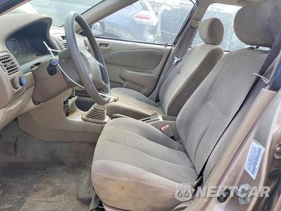 Zdjęcie 7 z 12 samochodu: 2002 TOYOTA COROLLA CE VIN:1NXBR12E72Z630778 - miniatura