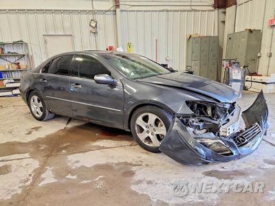Czwarte zdjęcie samochodu z boku: 2005 ACURA RL VIN:JH4KB16505C010401 - miniatura