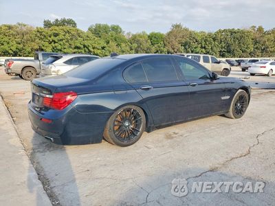 Trzecie zdjęcie samochodu z tyłu: 2014 BMW 750 I VIN:WBAYA8C55ED228398 - miniatura