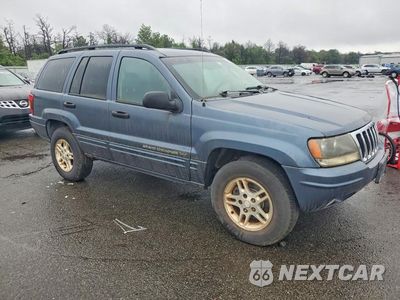 Czwarte zdjęcie samochodu z boku: 2002 JEEP GRAND CHEROKEE LAREDO VIN:1J4GW48S32C254646 - miniatura
