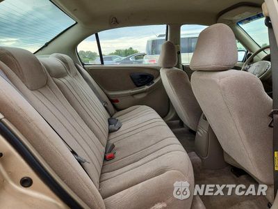 Zdjęcie 10 z 13 samochodu: 2002 CHEVROLET MALIBU VIN:1G1ND52J72M652521 - miniatura