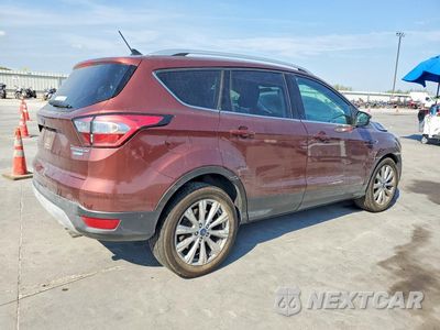 Trzecie zdjęcie samochodu z tyłu: 2018 FORD ESCAPE TITANIUM VIN:1FMCU0J99JUB16804 - miniatura