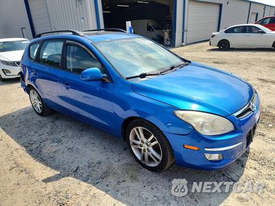 Czwarte zdjęcie samochodu z boku: 2010 HYUNDAI ELANTRA TOURING SE VIN:KMHDC8AE8AU060003 - miniatura