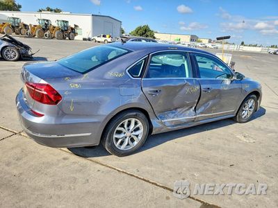 Trzecie zdjęcie samochodu z tyłu: 2017 VOLKSWAGEN PASSAT S VIN:1VWAT7A34HC023589 - miniatura