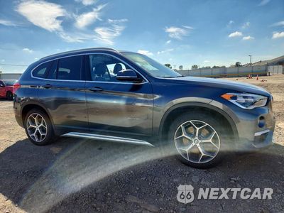 Czwarte zdjęcie samochodu z boku: 2017 BMW X1 XDRIVE28I VIN:WBXHT3C31H5F75200 - miniatura