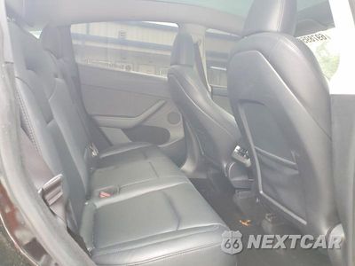 Zdjęcie 10 z 12 samochodu: 2024 TESLA MODEL Y VIN:7SAYGDEE8RA250319 - miniatura