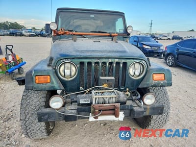 Piąte zdjęcie samochodu w środku: 2000 JEEP WRANGLER SAHARA VIN:1J4FA59S8YP728946 - miniatura
