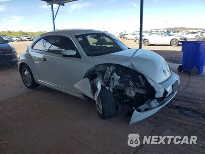 Czwarte zdjęcie samochodu z boku: 2016 VOLKSWAGEN BEETLE 1.8T VIN:3VWF17AT2GM638098 - miniatura