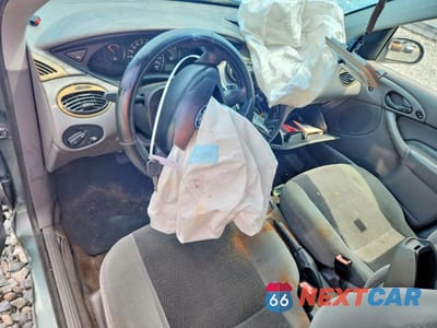 Zdjęcie 8 z 12 samochodu: 2003 FORD FOCUS SE VIN:1FAFP36383W213942 - miniatura