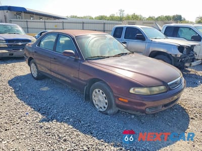 Czwarte zdjęcie samochodu z boku: 1996 MAZDA 626 DX VIN:1YVGE22C7T5573028 - miniatura