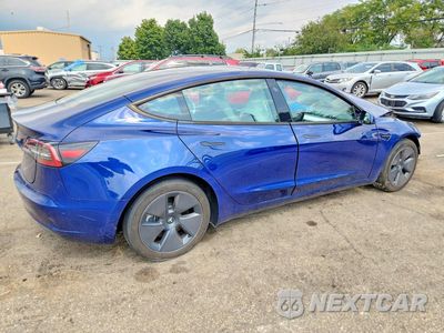 Trzecie zdjęcie samochodu z tyłu: 2023 TESLA MODEL 3 VIN:5YJ3E1EA5PF657023 - miniatura