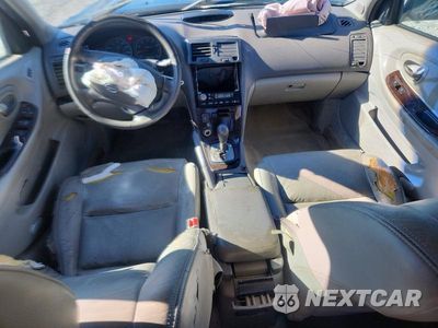 Zdjęcie 8 z 12 samochodu: 2003 NISSAN MAXIMA GXE VIN:JN1DA31A93T408669 - miniatura