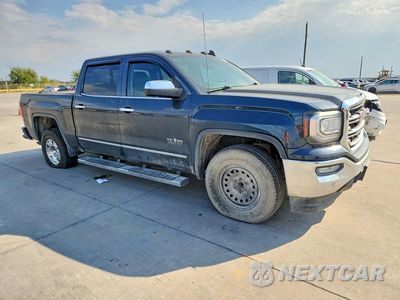 Czwarte zdjęcie samochodu z boku: 2018 GMC SIERRA C1500 SLT VIN:3GTP1NEC1JG520345 - miniatura