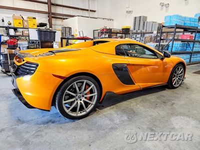 Trzecie zdjęcie samochodu z tyłu: 2015 MCLAREN AUTOMOTIVE 650S SPIDER VIN:SBM11FAA6FW004062 - miniatura