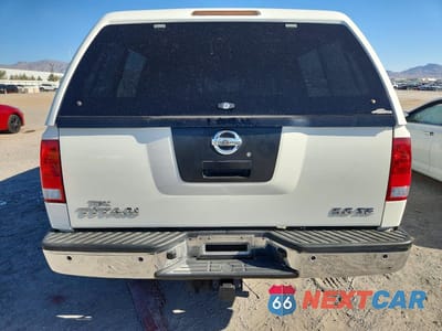 Zdjęcie 6 z 13 samochodu: 2010 NISSAN TITAN SE VIN:1N6AA0EC6AN316413 - miniatura