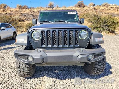 Piąte zdjęcie samochodu w środku: 2021 JEEP WRANGLER UNLIMITED SPORT VIN:1C4HJXDN2MW866901 - miniatura