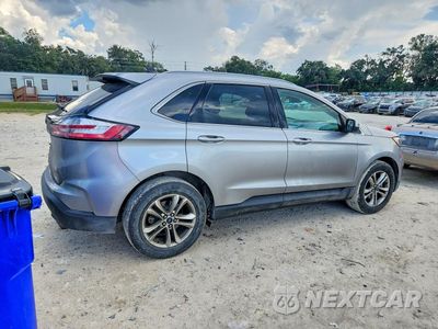 Trzecie zdjęcie samochodu z tyłu: 2020 FORD EDGE SEL VIN:2FMPK3J97LBB61242 - miniatura