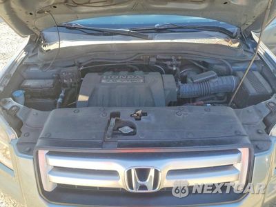Zdjęcie 12 z 14 samochodu: 2006 HONDA PILOT EX VIN:2HKYF18526H502902 - miniatura