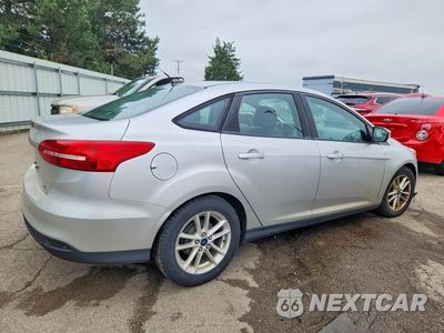 Trzecie zdjęcie samochodu z tyłu: 2016 FORD FOCUS SE VIN:1FADP3F29GL251069 - miniatura