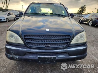 Piąte zdjęcie samochodu w środku: 2001 MERCEDES-BENZ ML 320 VIN:4JGAB54E11A240165 - miniatura