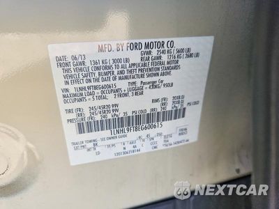 Zdjęcie 13 z 13 samochodu: 2014 LINCOLN MKS VIN:1LNHL9FT8EG600615 - miniatura