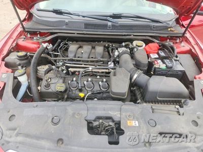 Zdjęcie 11 z 12 samochodu: 2018 FORD TAURUS SEL VIN:1FAHP2H86JG133185 - miniatura