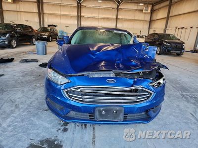 Piąte zdjęcie samochodu w środku: 2017 FORD FUSION SE HYBRID VIN:3FA6P0LU0HR144587 - miniatura