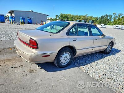 Trzecie zdjęcie samochodu z tyłu: 1999 OLDSMOBILE 88 BASE VIN:1G3HN52K6X4834230 - miniatura