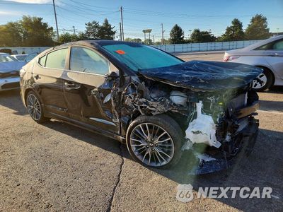 Czwarte zdjęcie samochodu z boku: 2018 HYUNDAI ELANTRA SPORT VIN:KMHD04LB8JU481028 - miniatura