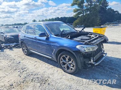 Czwarte zdjęcie samochodu z boku: 2021 BMW X3 XDRIVE30E VIN:5UXTS1C02M9G39959 - miniatura