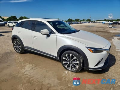 Czwarte zdjęcie samochodu z boku: 2019 MAZDA CX-3 GRAND TOURING VIN:JM1DKFD78K1412363 - miniatura