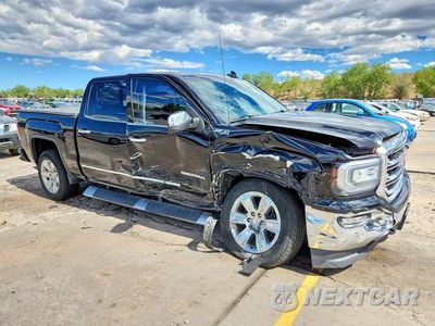 Czwarte zdjęcie samochodu z boku: 2017 GMC SIERRA K1500 SLT VIN:3GTU2NEC2HG513818 - miniatura