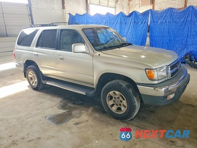 Czwarte zdjęcie samochodu z boku: 1999 TOYOTA 4RUNNER SR5 VIN:JT3GN86R2X0121454 - miniatura